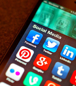 Digital Marketing: What New Grads Need To Know, image of social icons of mobile device