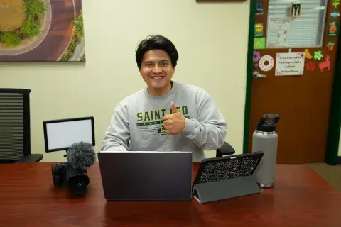 Emiliano Campos-Hernandez at desk